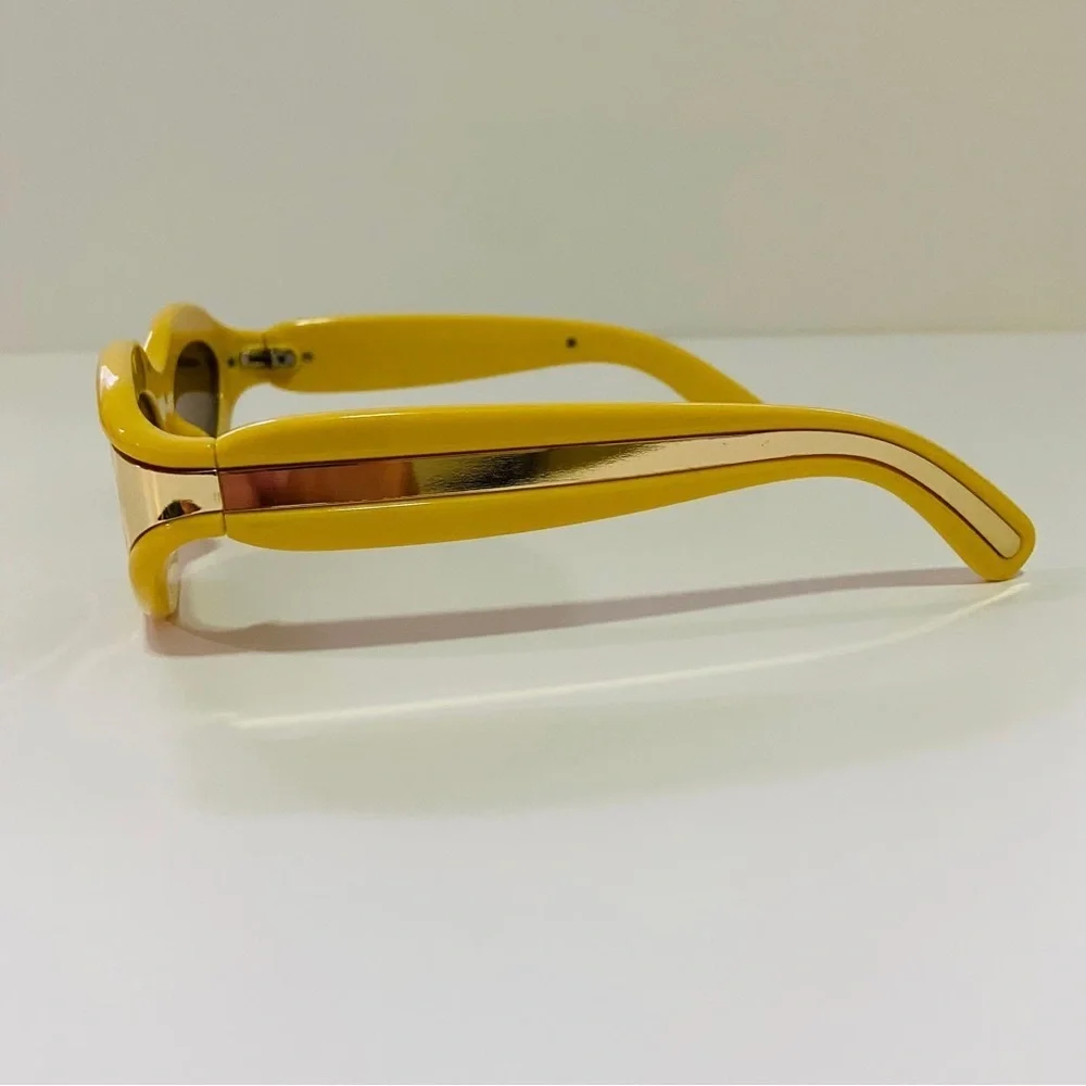 Luxury futuristic cat eye oval mustard pastel yellow steampunk sunglasses